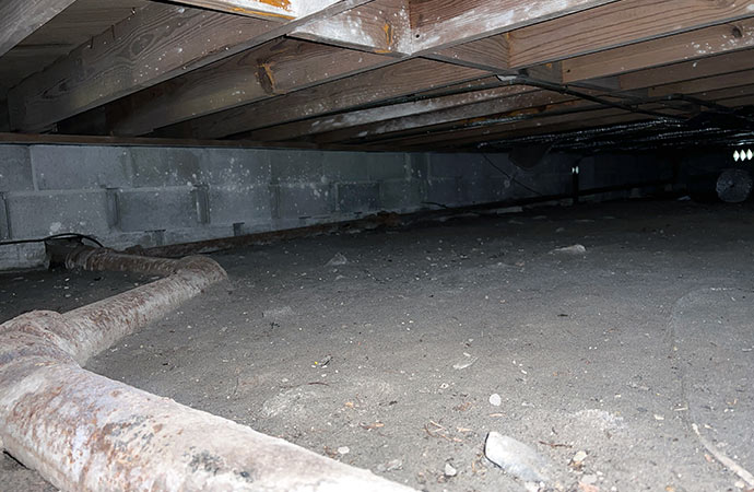 Dirty crawl space under house